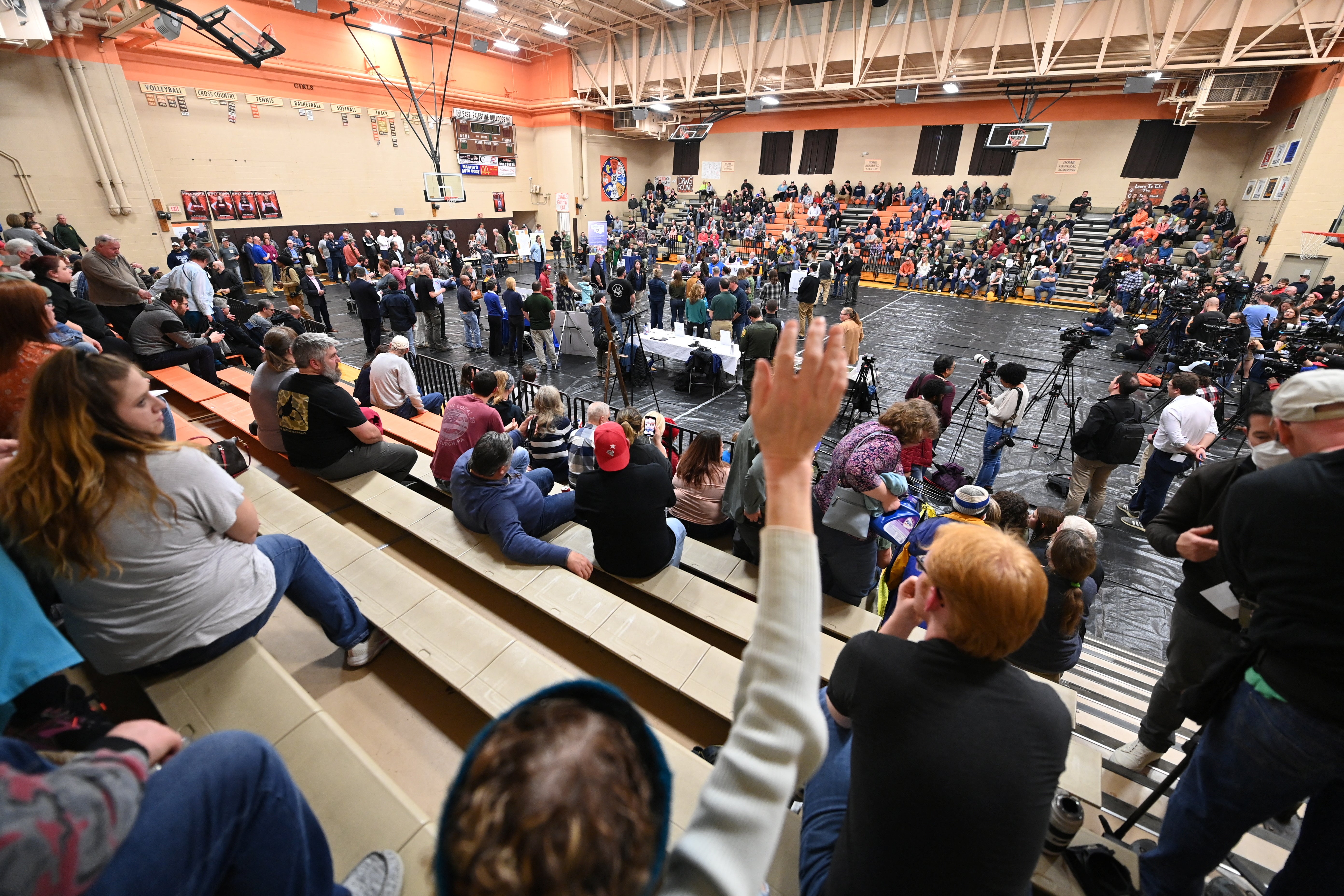 Members of the community gather to discuss their safety and other environmental concerns at a town hall meeting following a train derailment that spilled toxic chemicals, in East Palestine