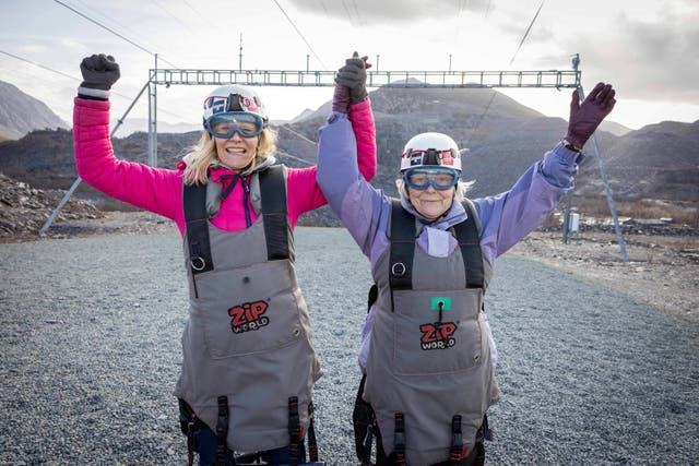 Eighty-five-year-old Sally Webster (right) from Care UK’s Deewater Grange in Chester completed the world’s fastest zipline alongside her daughter Juliet (left) (Darren Robinson Photography/CareUK)