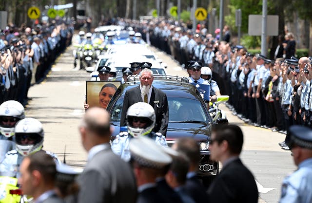 <p>Memorial service held for police officers killed Wieambilla shooting</p>