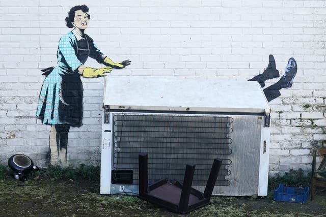 An artwork by street artist Banksy has had its freezer removed once more (Gareth Fuller/PA)