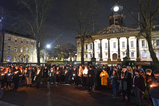 Members of the public attend a candlelit vigil at Dalton Square, Lancaster, in memory of transgender teenager Brianna Ghey (Peter Powell/PA)