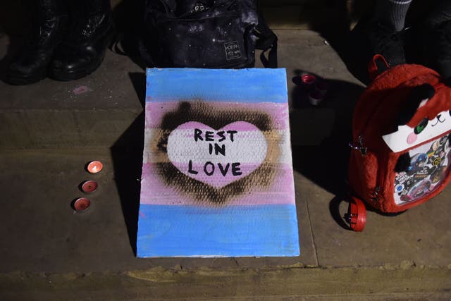 A placard as members of the public attend a candle-lit vigil outside St George’s Hall, Liverpool, in memory of transgender teenager Brianna Ghey, who was fatally stabbed in a park on Saturday (Peter Powell/PA)