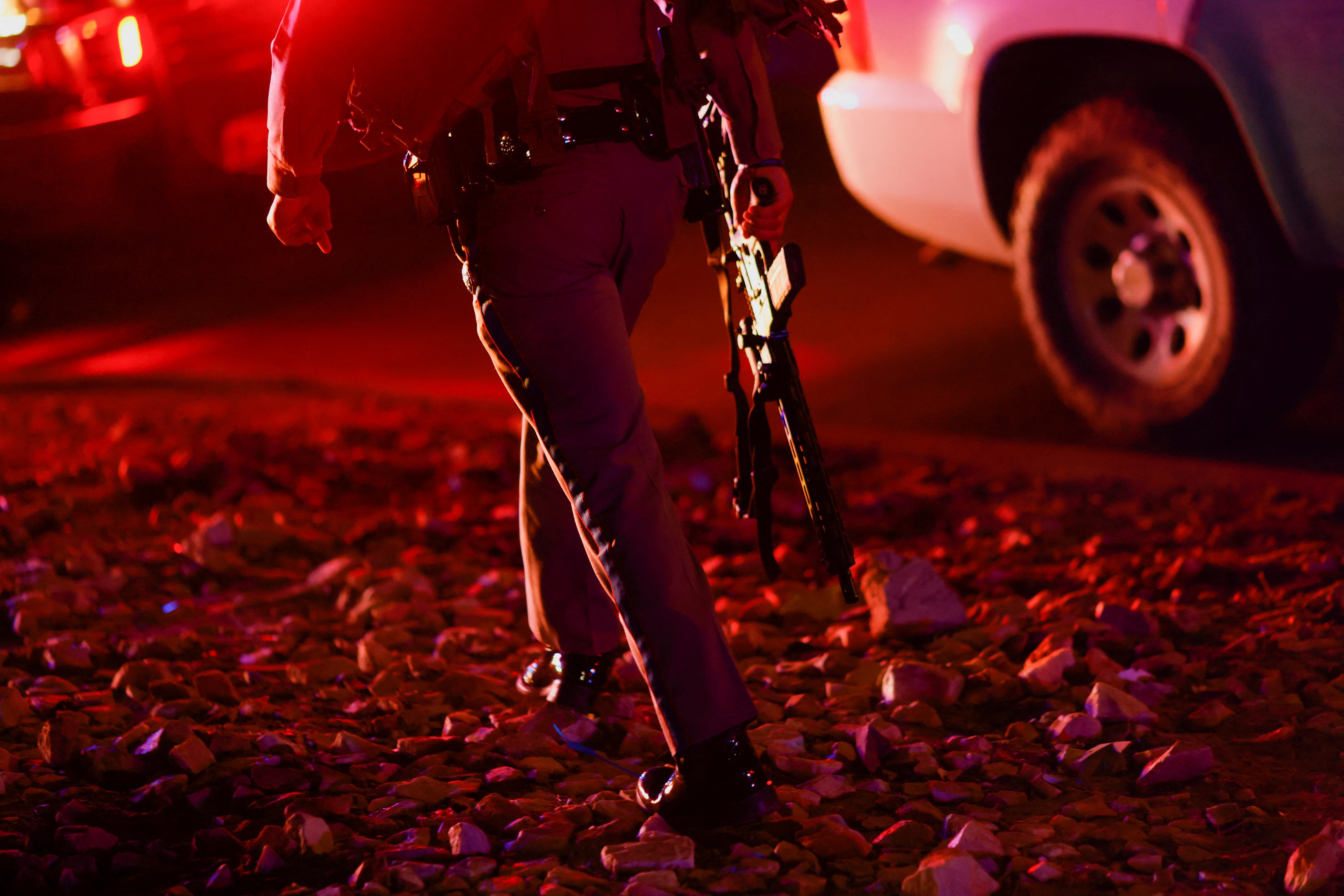 A law enforcement member walks outside the Cielo Vista Mall after a shooting, in El Paso, Texas, U.S February 15, 2023