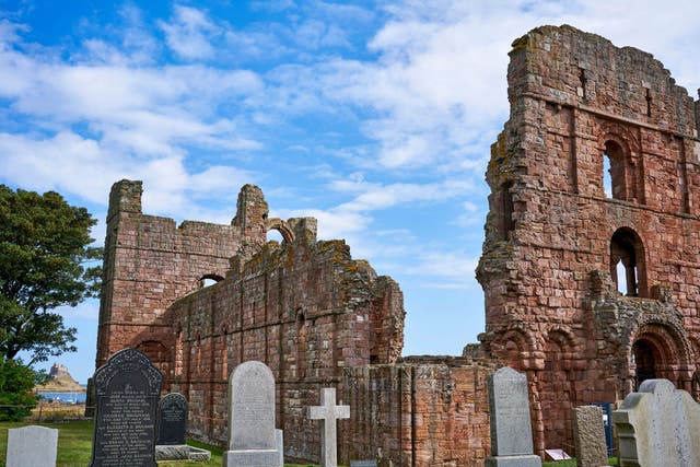 Lindisfarne Priory and museum was reopening following its closure in the autumn for refurbishment (English Heritage/PA)