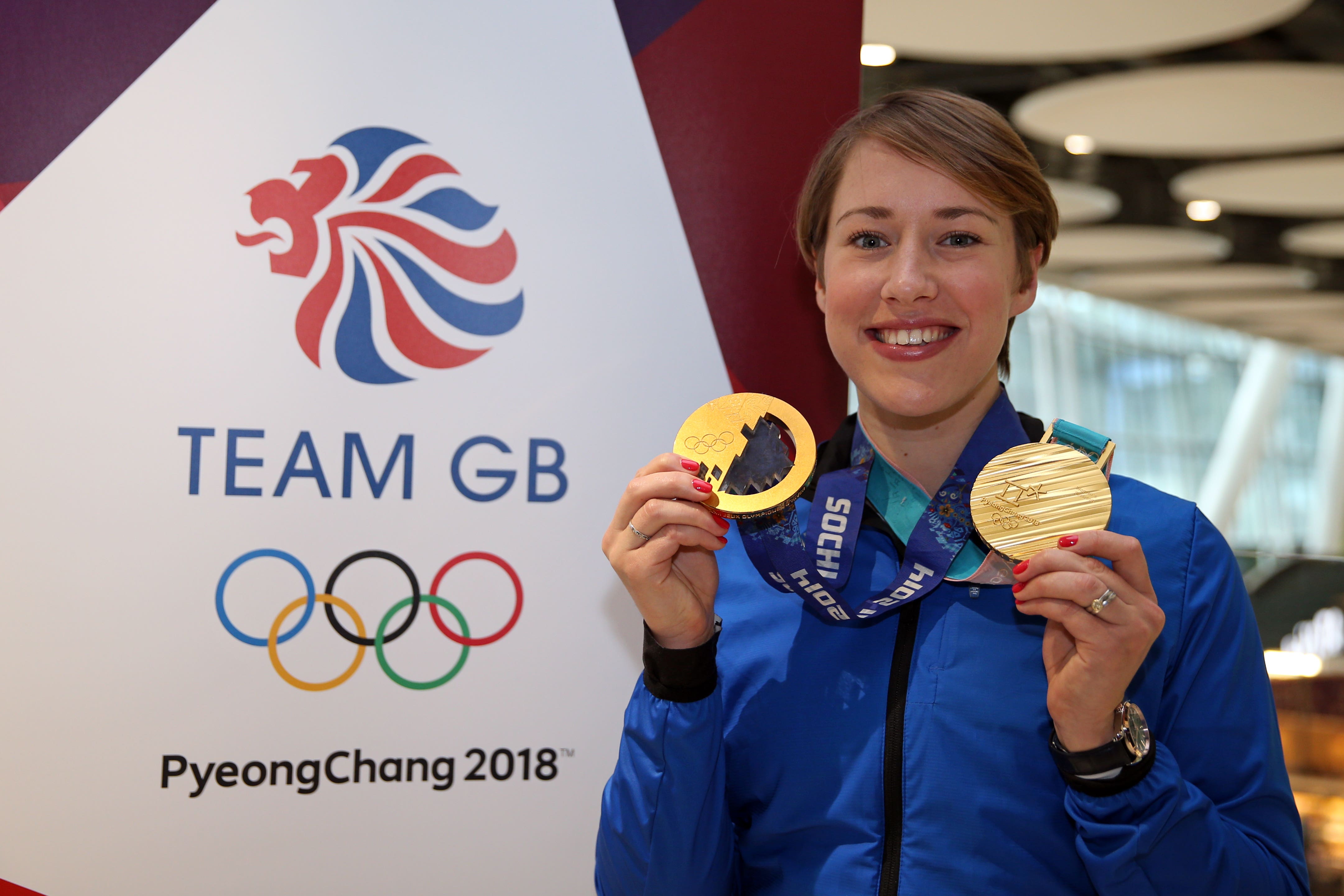 Great Britain’s Lizzy Yarnold poses with her 2014 and 2018 gold medals (Steve Paston/PA)