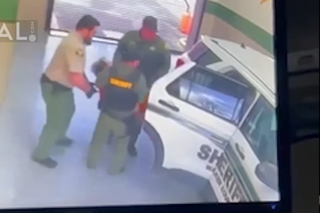 <p> Screengrab from a video shows Walker County Jail officers taking Anthony Mitchell to hosital in unconcious state </p>