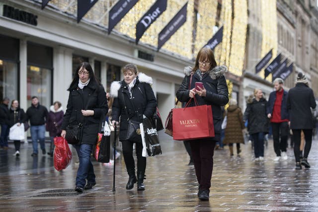 Shoppers on Buchanan Street in Glasgow city centre. Retailers saw sales improve last month amid demand for jewellery and furnishings (John Linton/PA)