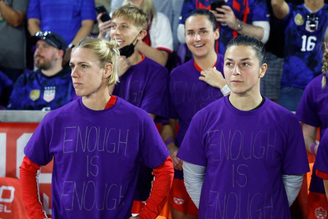 <p>Canada’s Sophie Schmidt and Sabrina D'Angelo with the purple ‘Enough is Enough’ jerseys </p>
