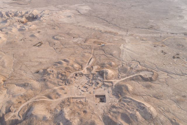 Aerial view of the Temple mound, looking south, showing the walled sacredprecinct in the distanceat Girsu, Southern Iraq.Remains from successive periods,from 3,000 BCE TO 2,000 BCE (Sébastien Rey/The Girsu Project/PA)
