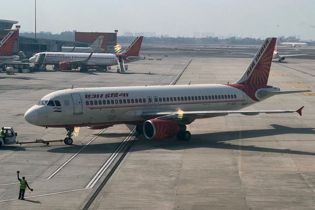 <p>An Air India aircraft on the tarmac at the Indira Gandhi international airport in New Delhi on 20 January</p>