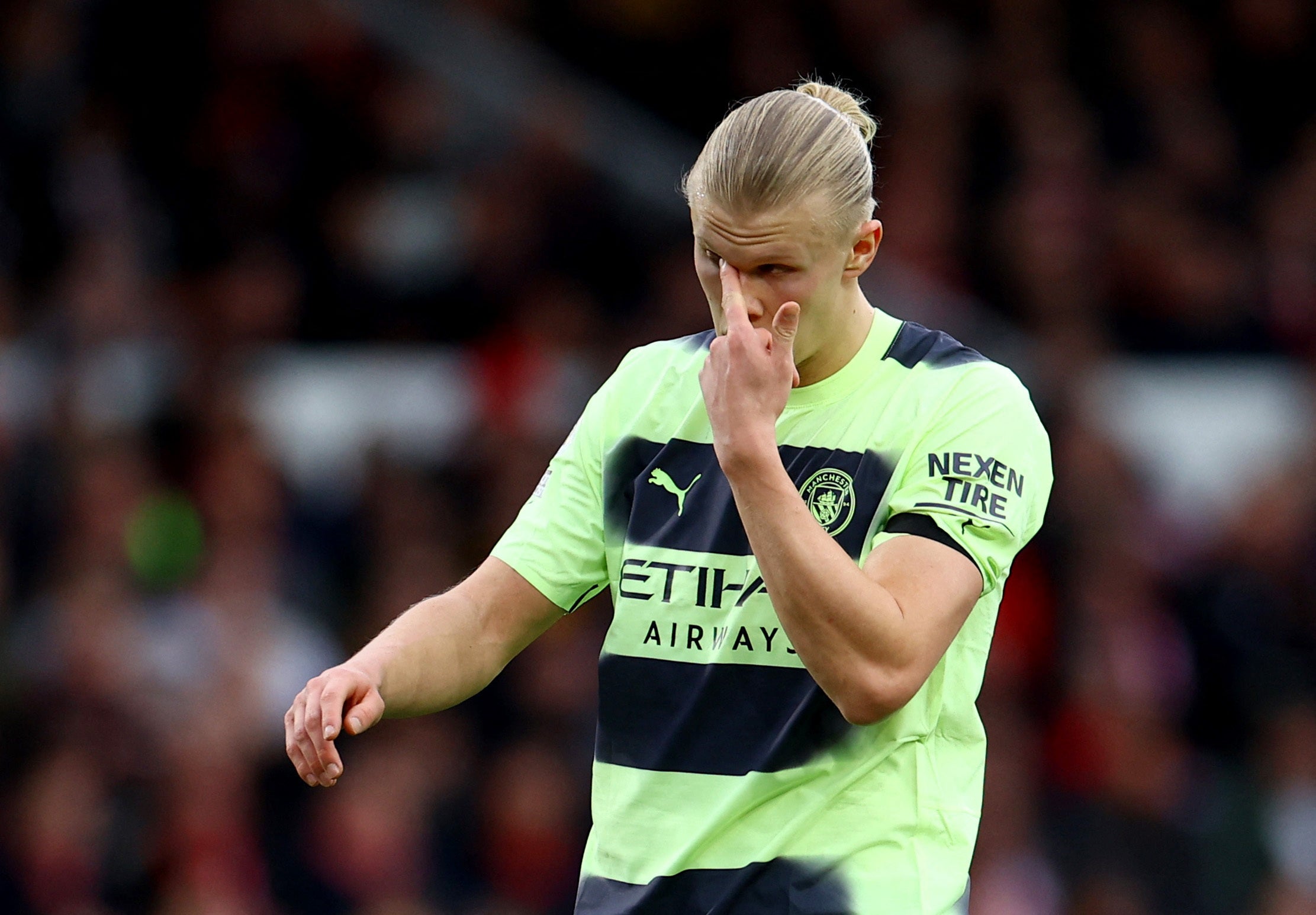 Erling Haaland reacts to a missed opportunity against Forest