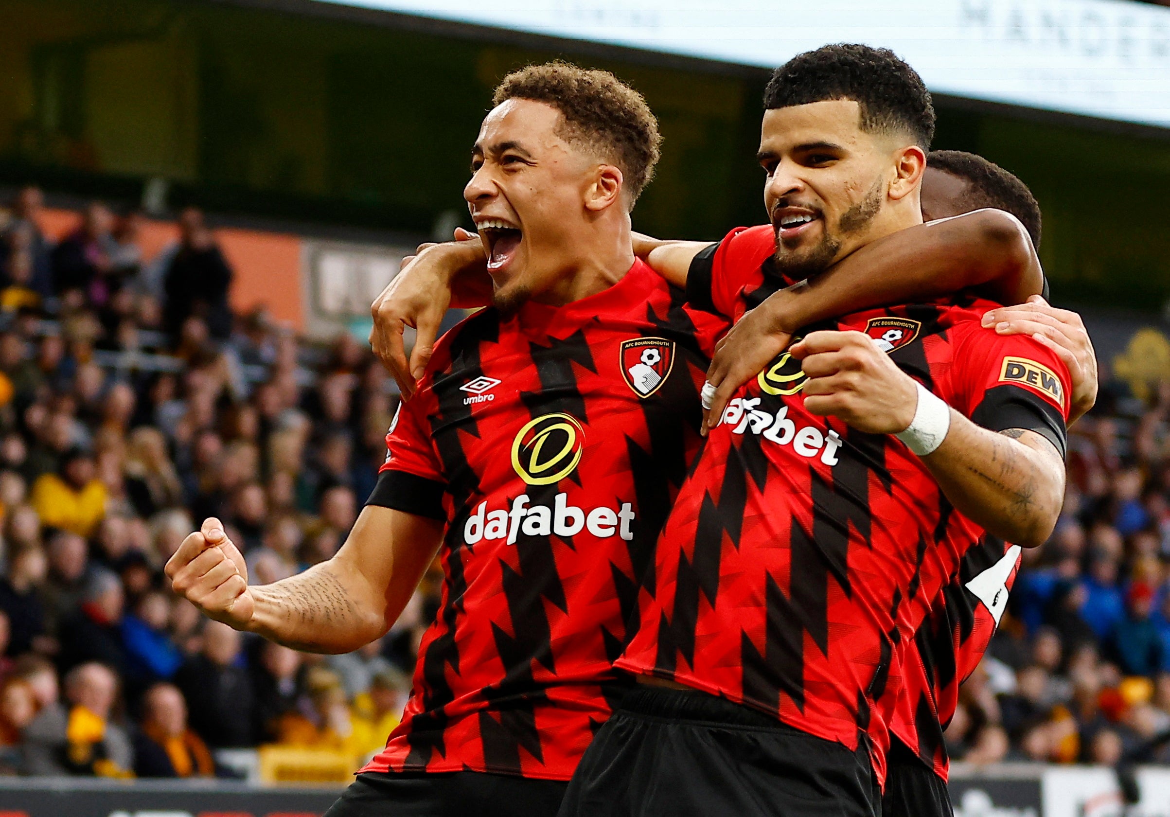 Marcus Tavernier, left, celebrates after scoring Bournemouth’s goal