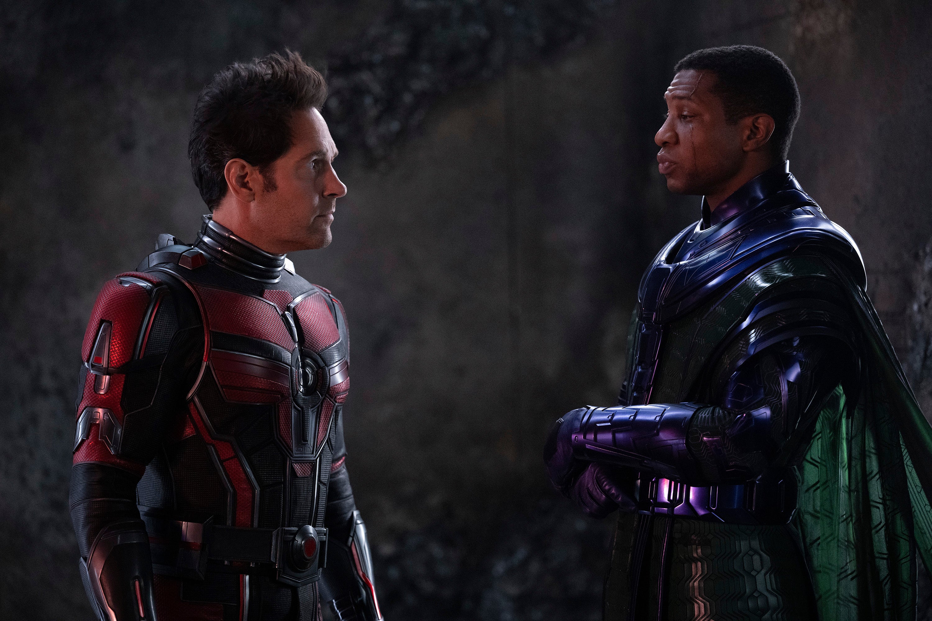 This image released by Disney shows Paul Rudd, left, and Jonathan Majors in a scene from Ant-Man and The Wasp: Quantumania