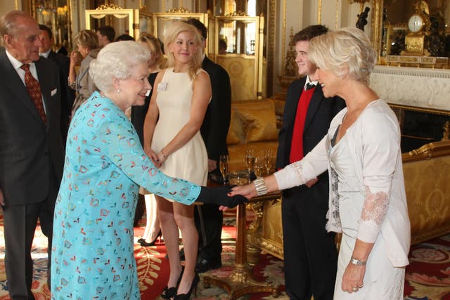 The Queen meets Dame Helen Mirren at a reception in 2011 (PA)