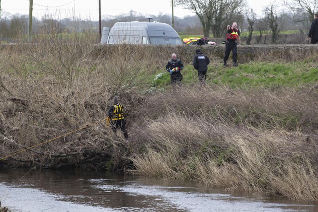 A police diving team at the River Wyre near St Michael’s on Wyre, Lancashire (Jason Roberts/PA)