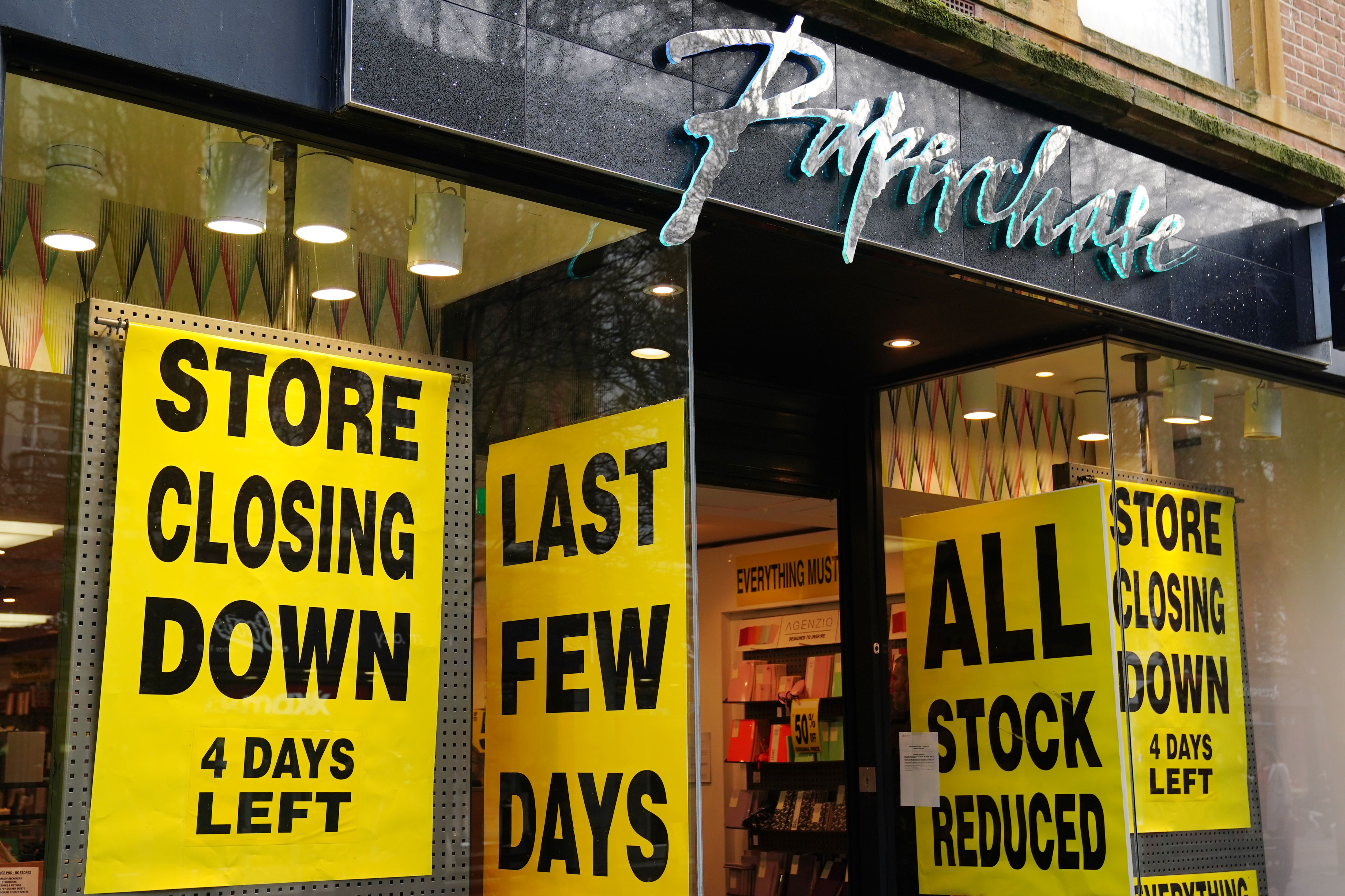 Closing down signs in the window of the Paperchase shop on Worcester high street (David Davies/PA)
