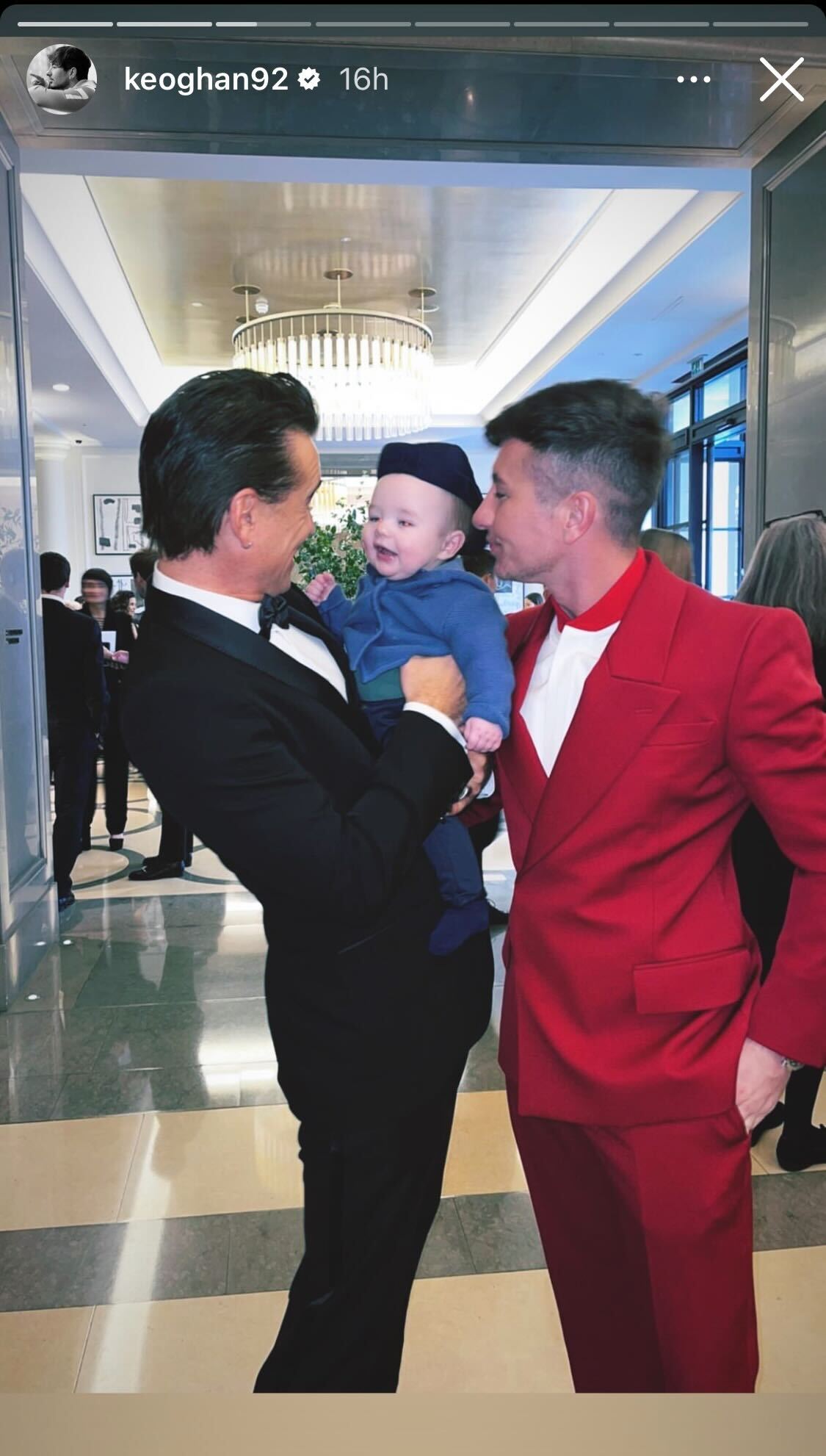 Colin Farrell (left) and Barry Keoghan look at Keoghan’s baby son Brando as he laughs