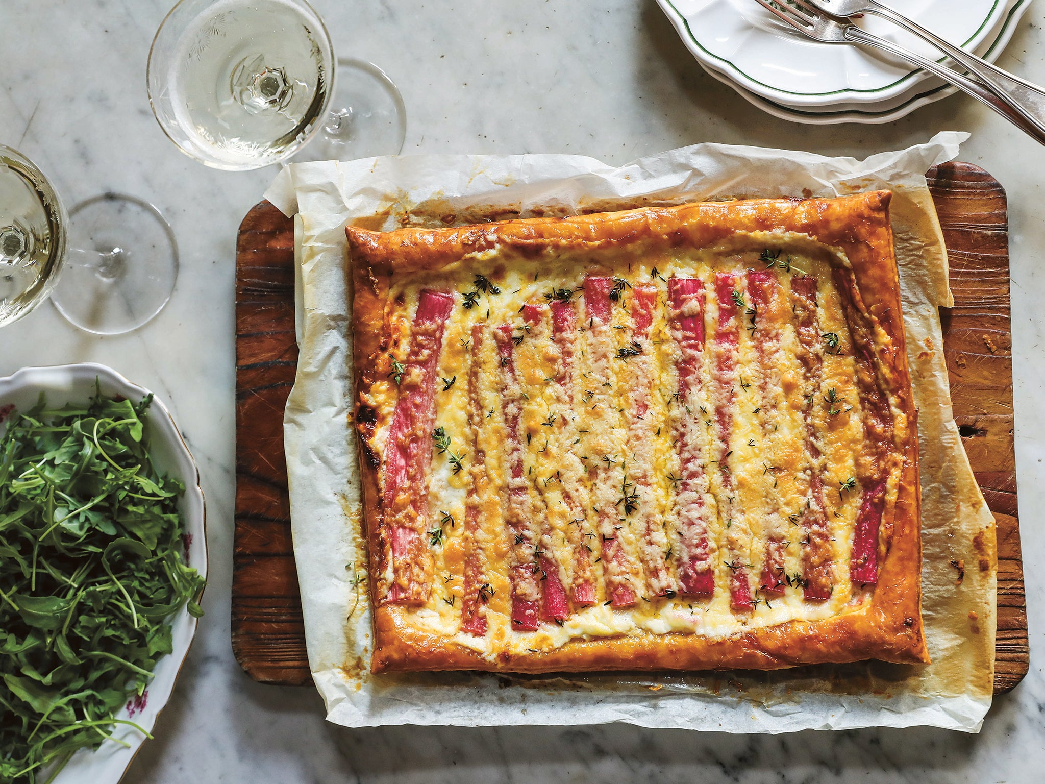 Tangy rhubarb meets melted Cheddar in this delicious savoury tart