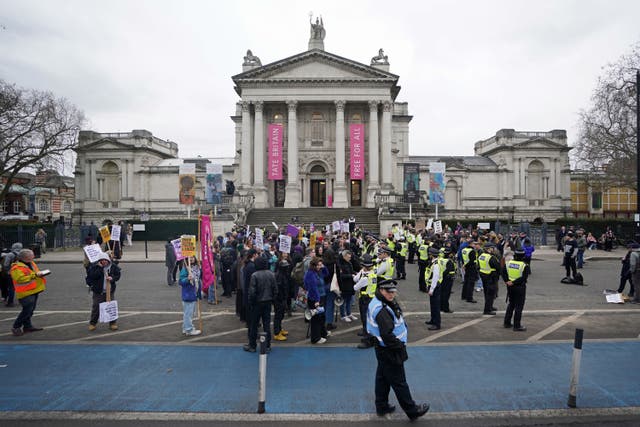 Protesters outside the Tate Britain, which was hosting Drag Queen Story Hour UK (James Manning/PA)