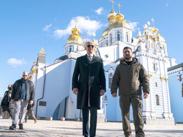 <p>US President Joe Biden walks with Ukrainian President Volodymyr Zelenskiy at St. Michael’s Golden-Domed Cathedral </p>