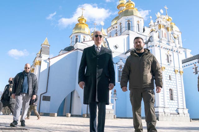 <p>US President Joe Biden walks with Ukrainian President Volodymyr Zelenskiy at St. Michael’s Golden-Domed Cathedral </p>