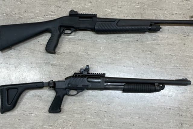 Weatherby pump action shotgun (top) used by Jake Davison next to a police issue tactical single barrel 12-gauge pump action shotgun shown in the inquest into the deaths of five people shot dead by Jake Davison (Plymouth HM Coroner/PA)