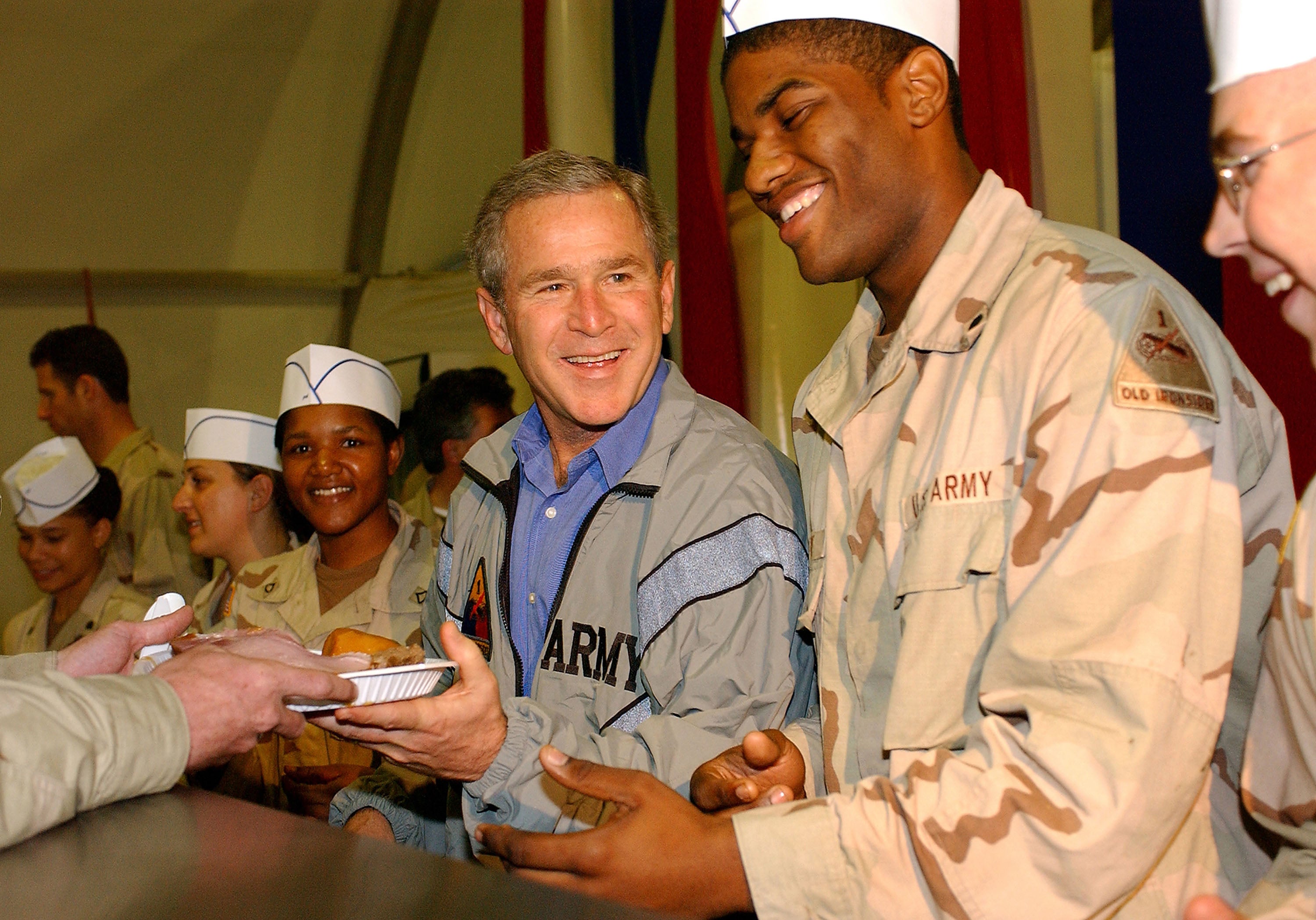 George W Bush paid a visit to US troops in Iraq in 2003 – one of many visits made by US presidents to war zones