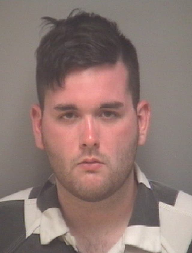 <p>In this handout provided by Albemarle-Charlottesville Regional Jail, James Alex Fields Jr of Maumee, Ohio poses for a mugshot after he drove his car into a group of counter-protesters killing one and injuring 35 on 12 August 2017 in Charlottesville, Virginia</p>