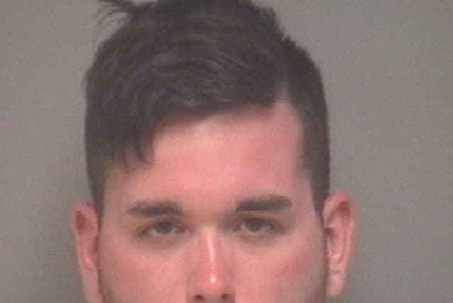 <p>In this handout provided by Albemarle-Charlottesville Regional Jail, James Alex Fields Jr of Maumee, Ohio poses for a mugshot after he drove his car into a group of counter-protesters killing one and injuring 35 on 12 August 2017 in Charlottesville, Virginia</p>