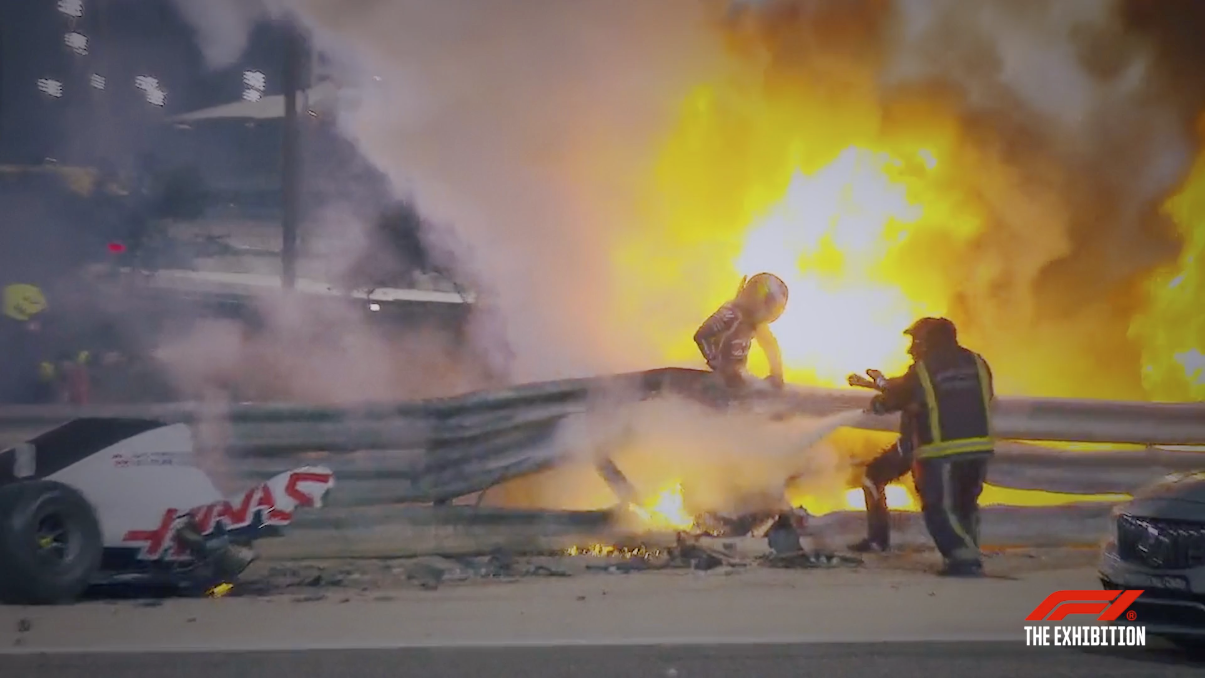 Romain Grosjean miraculously pulls himself from the wreckage