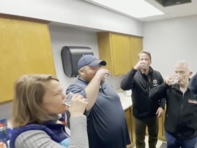 <p>Ohio officials including Ohio EPA chief Anne Vogel, East Palestine Mayor Trent Conaway, and Congressman Bill Johnson drink water from the village after a Norfolk Southern train derailment in early February </p>