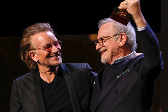 Bono presents Steven Spielberg with lifetime award at Berlin film festival (Joel C Ryan/AP)