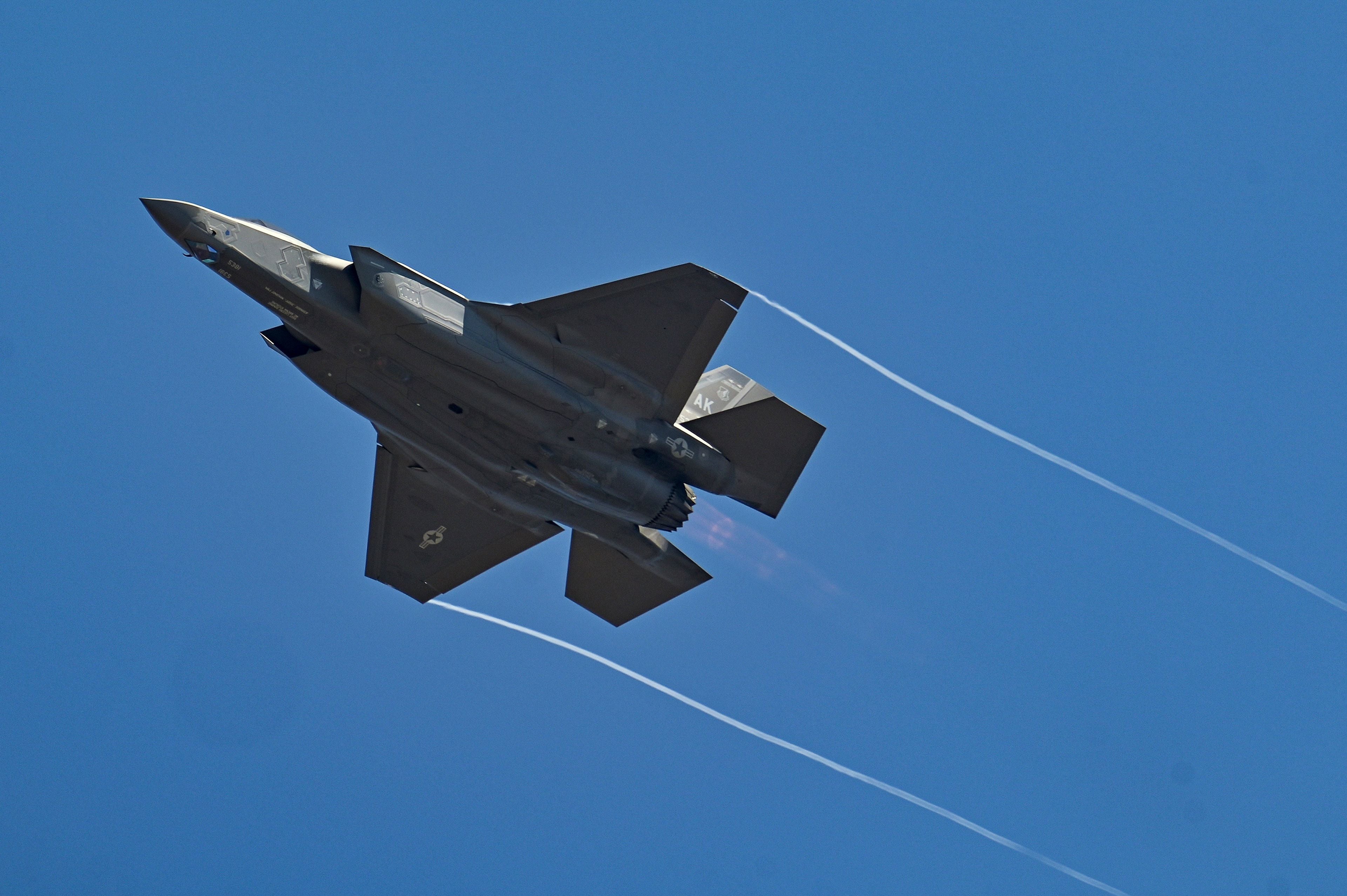 A US Air Force’s (USAF) fifth-generation supersonic multirole F-35 fighter jet flies past during a flying display on the second day of the 14th edition of Aero India 2023 at the Yelahanka Air Force Station in Bengaluru