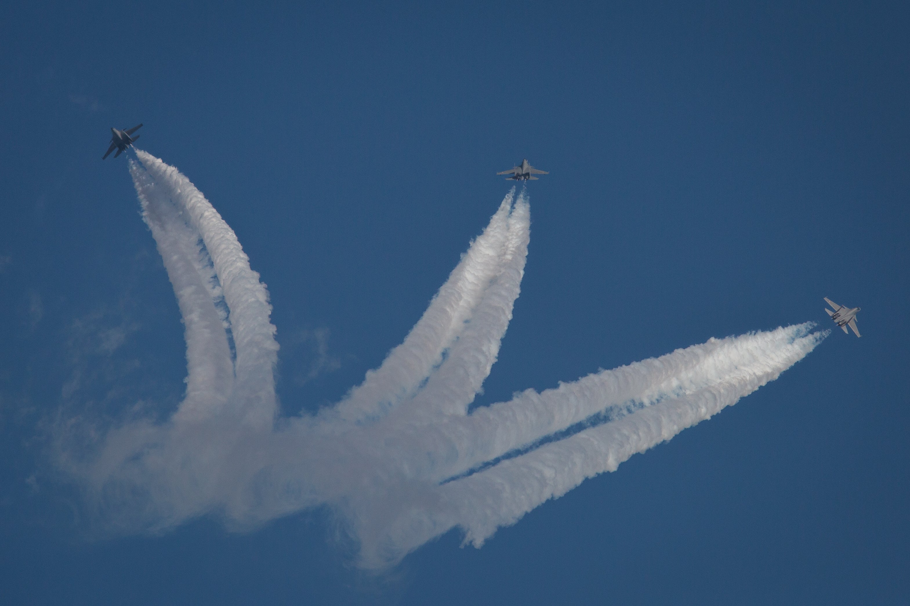 Indian Air Force Sukhoi Su-30MKI fighter planes perform during the inauguration of the Aero India 2023 at the Yelahanka Air Force Station in Bengaluru