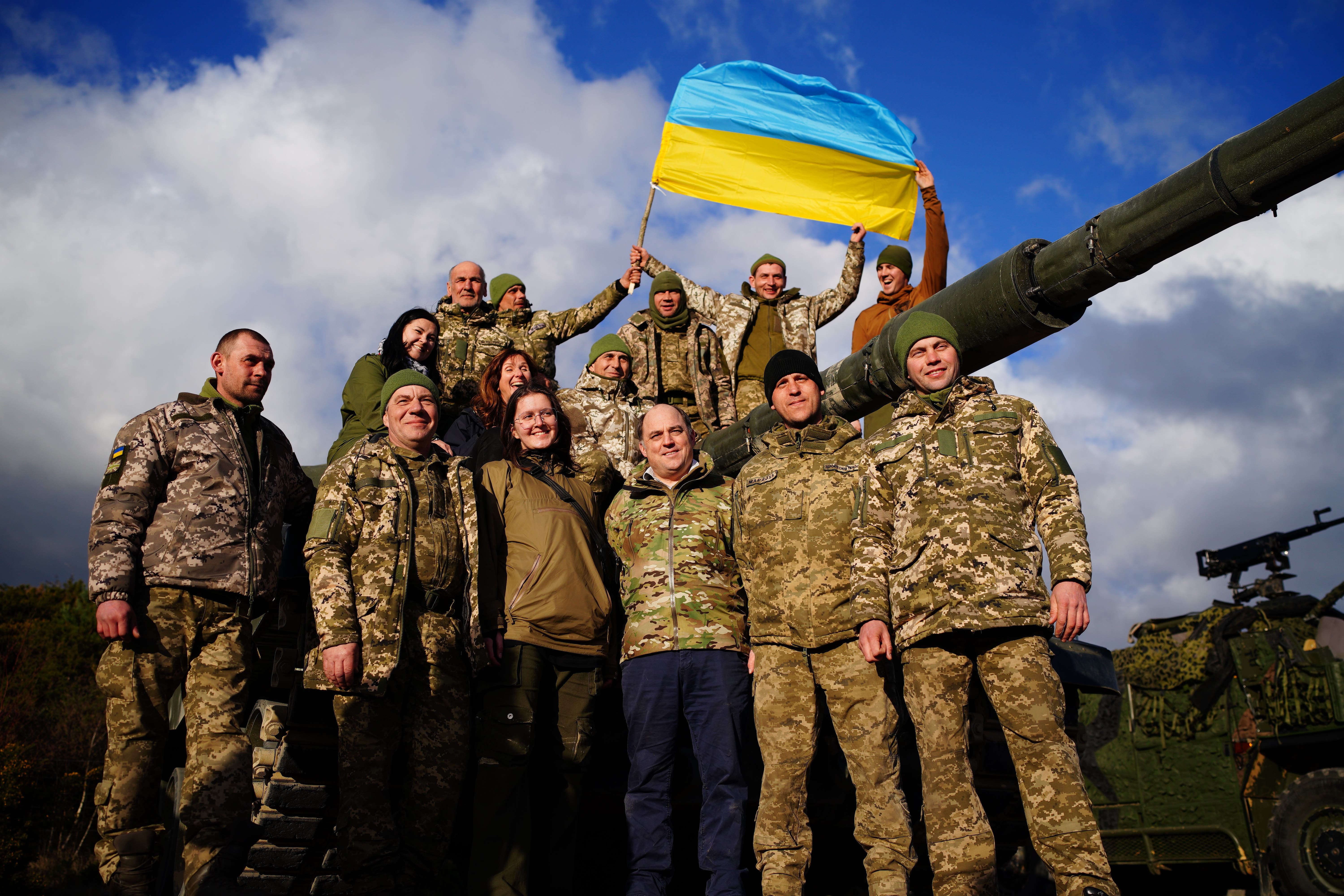 Defence secretary Ben Wallace, centre right, with Ukrainian soldiers training at an Army base in the South West earlier this year