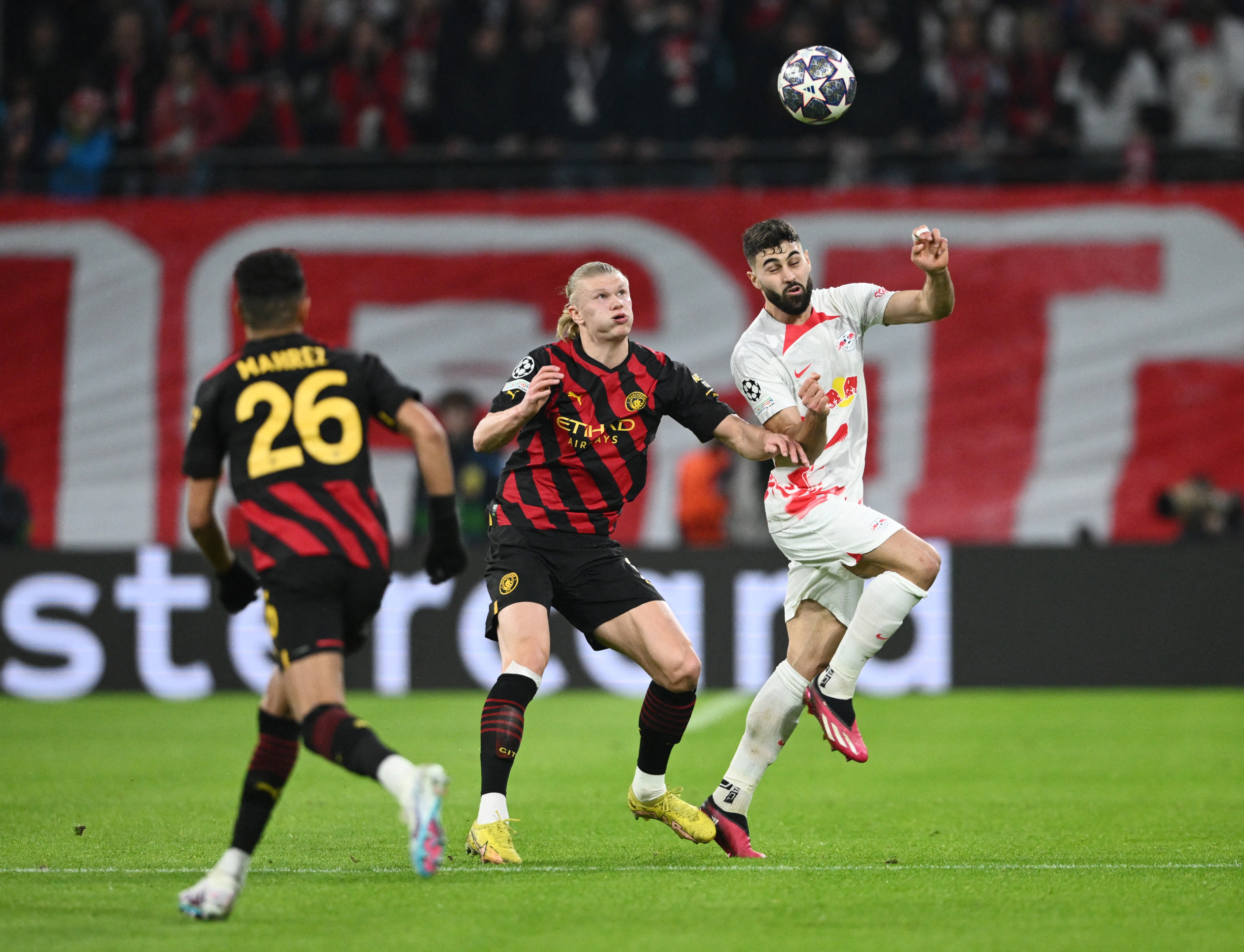 Erling Haaland battles with Leipzig defender Josko Gvardiol