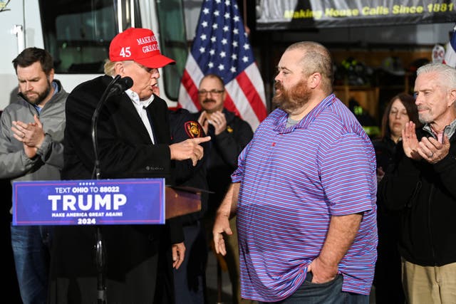 <p>Former U.S. President Donald Trump speaks about the recent derailment of a train carrying hazardous waste, during an event at a fire station, as East Palestine Mayor Trent Conaway stands next to him</p>
