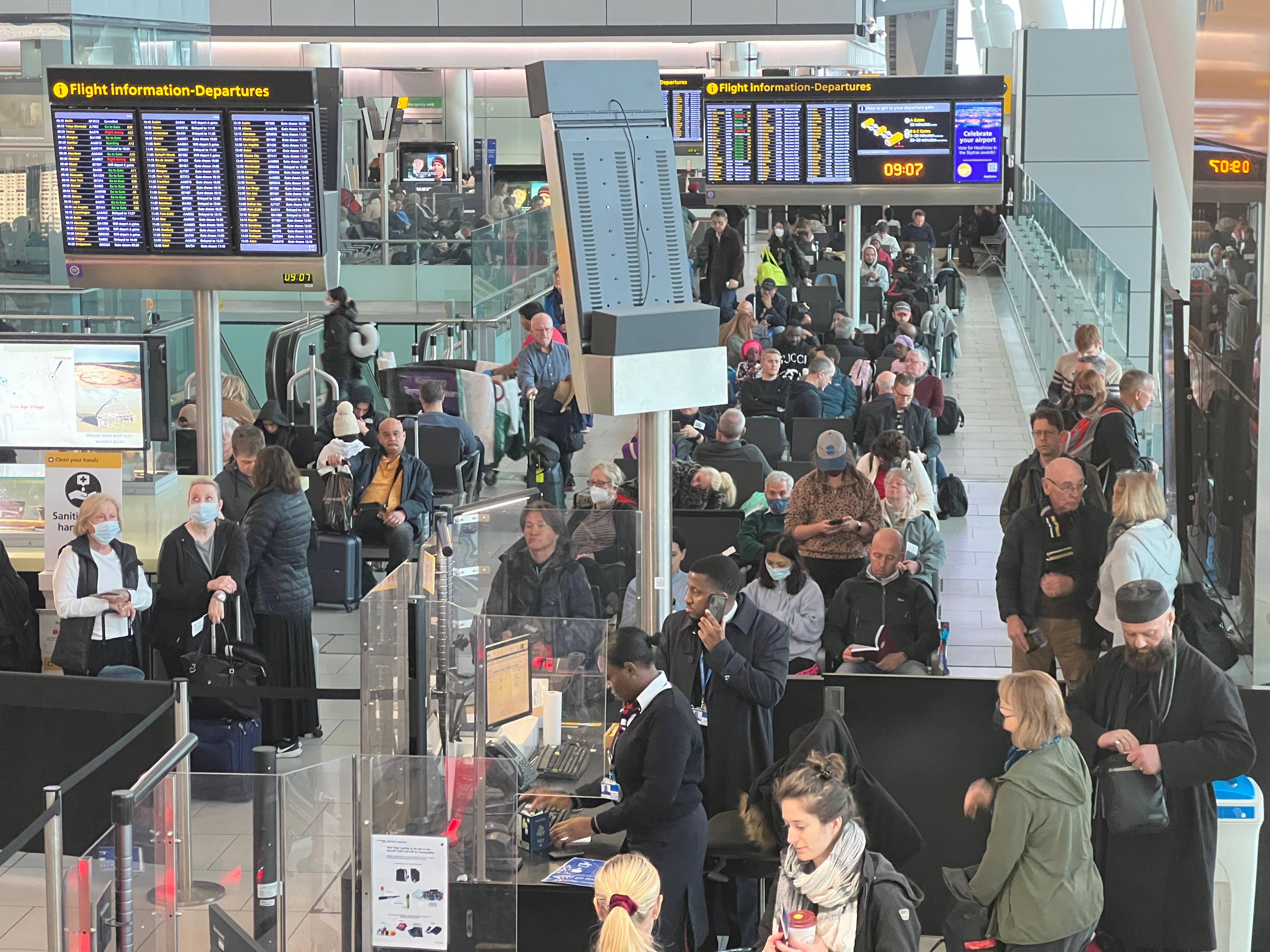 <p>Going places: Passengers at Heathrow airport Terminal 5 in February 2023</p>