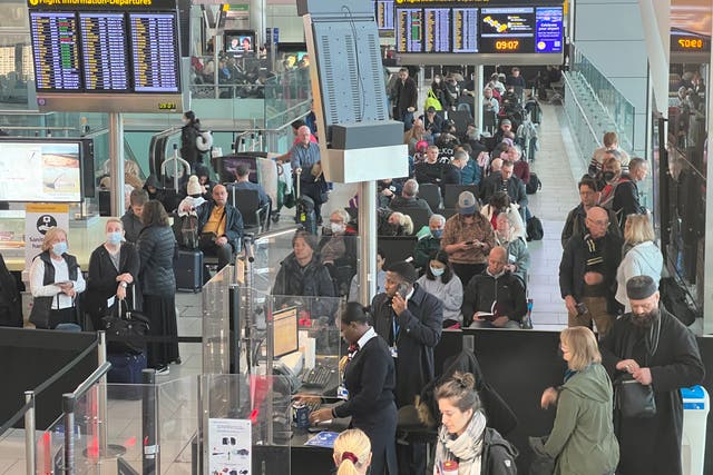 <p>Going places: Passengers at Heathrow airport Terminal 5 in February 2023</p>
