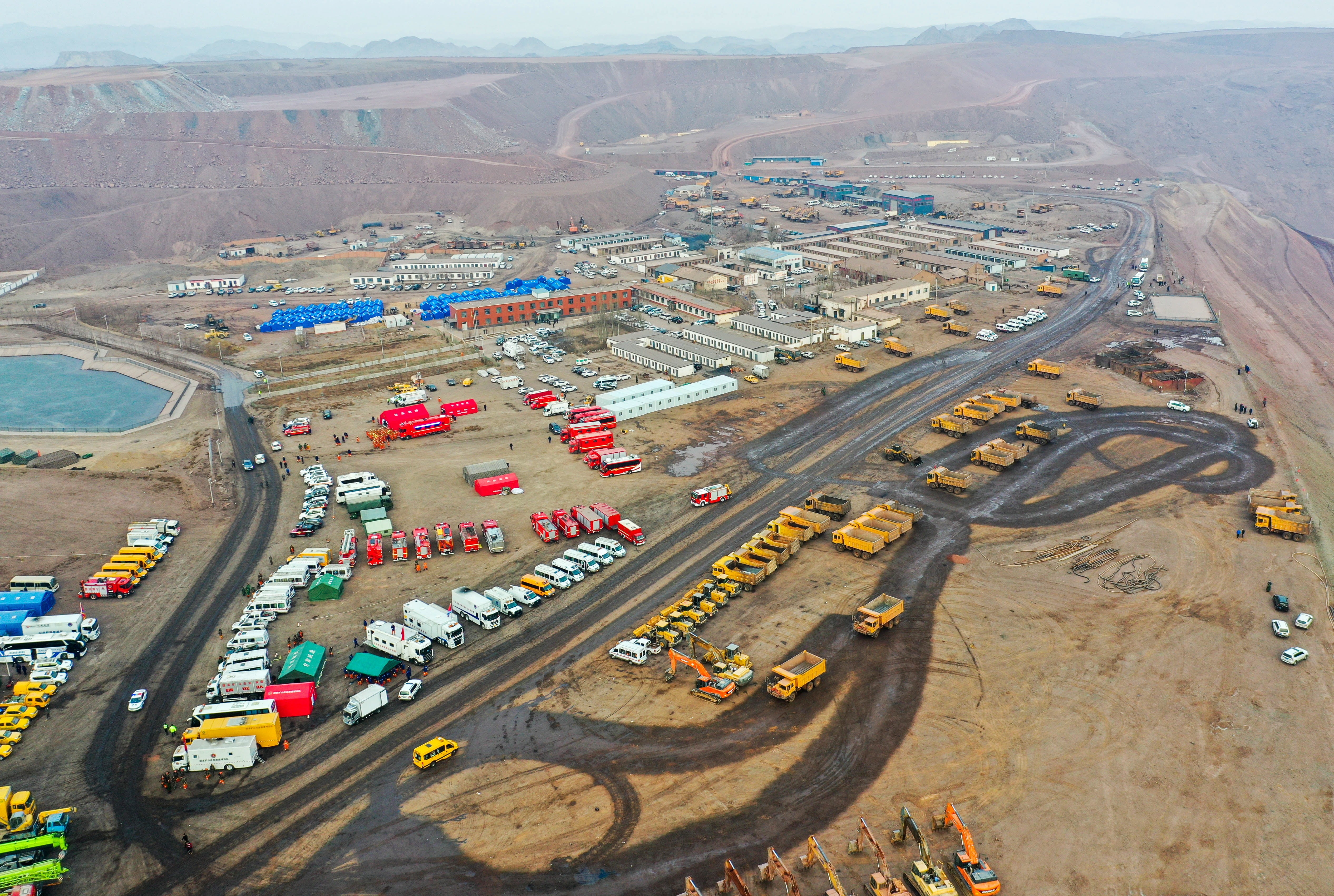 An aerial view of rescue vehicles near the site of a collapsed coal mine in Alxa League