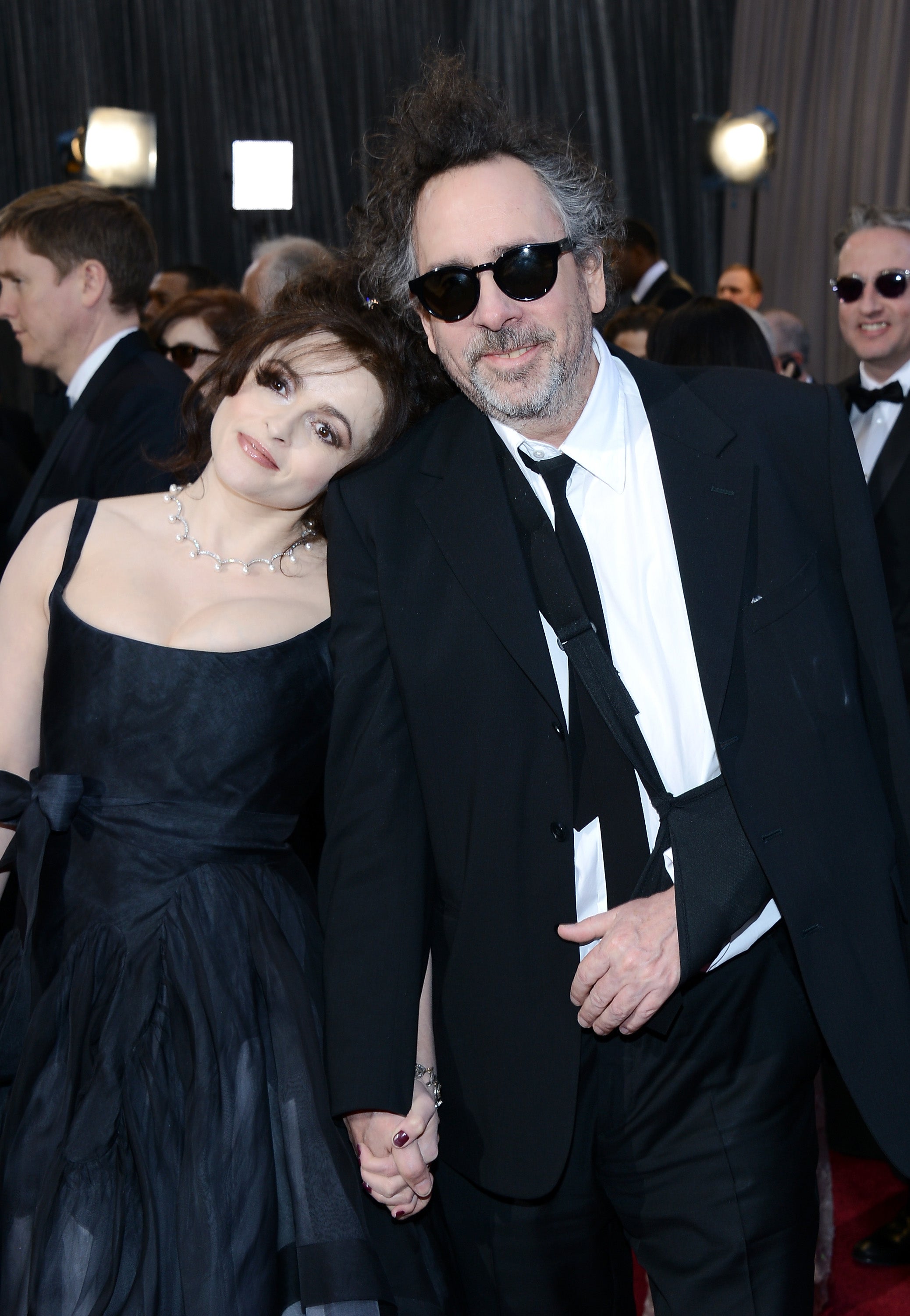 Filmmaker Tim Burton and actress Helena Bonham Carter arrive at the Oscars at Hollywood & Highland Center on February 24, 2013