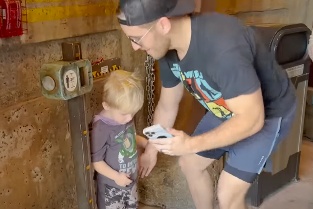<p>A screenshot of Ty Kelly’s son, Kannon, getting measured at Disney wearing his adapted ‘platform’ shoes</p>