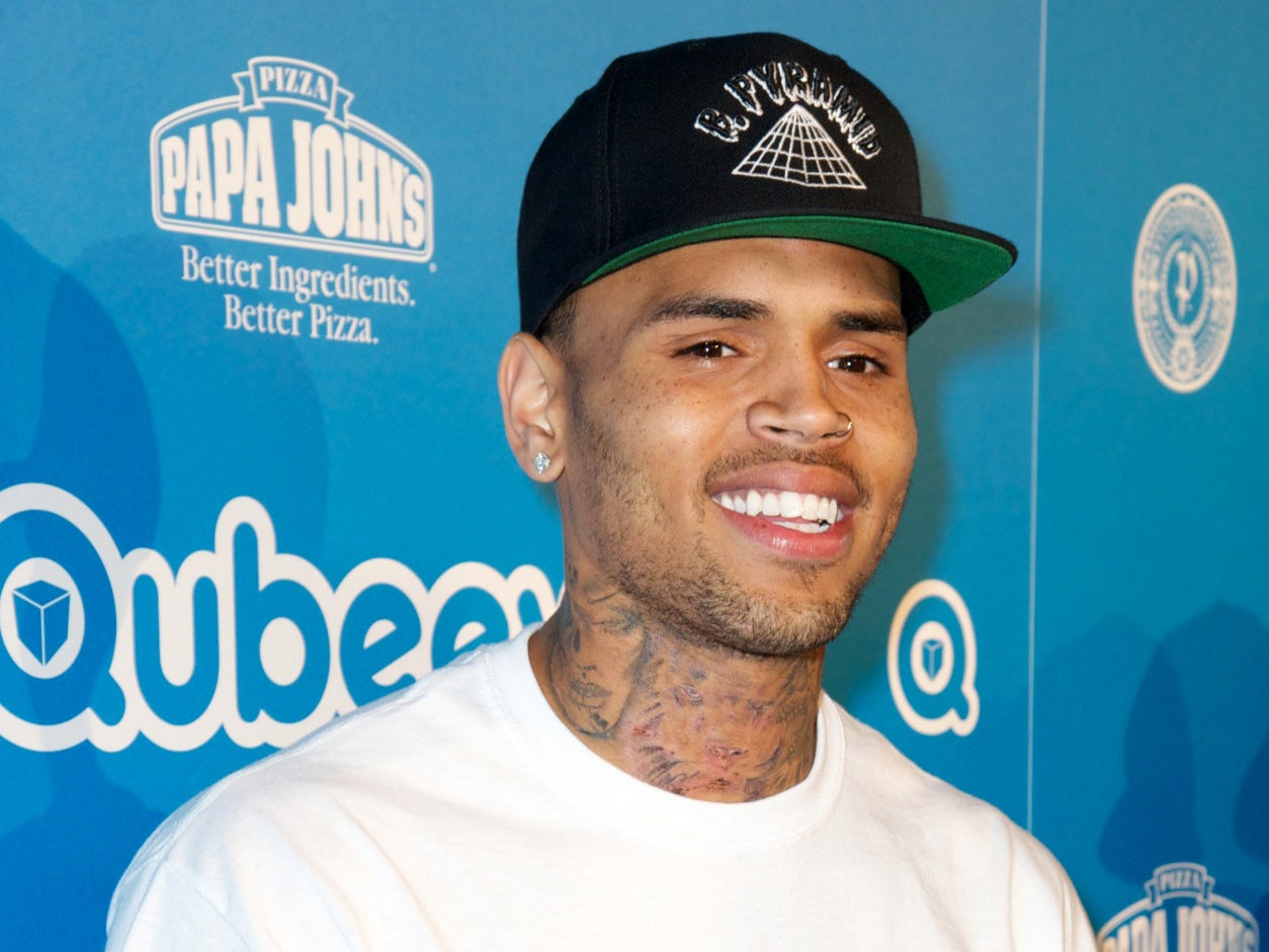 Chris Brown appears on the blue carpet for the Qubeey Launch Party on October 20, 2012