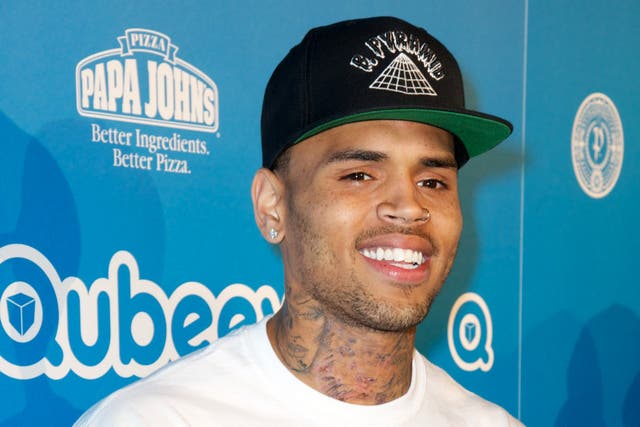 <p>Chris Brown appears on the blue carpet for the Qubeey Launch Party on October 20, 2012 </p>