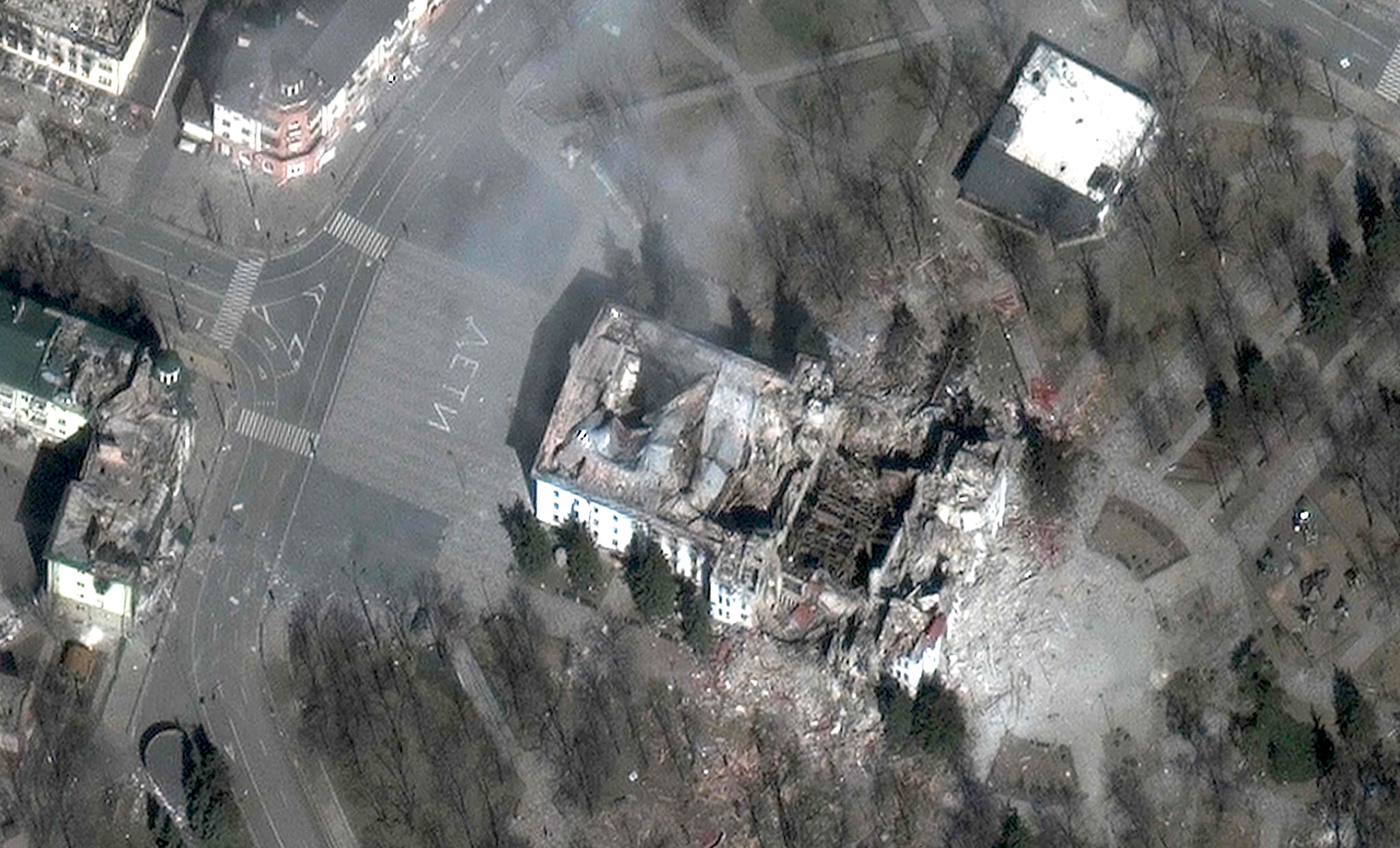 Damage to the Mariupol theatre and nearby buildings