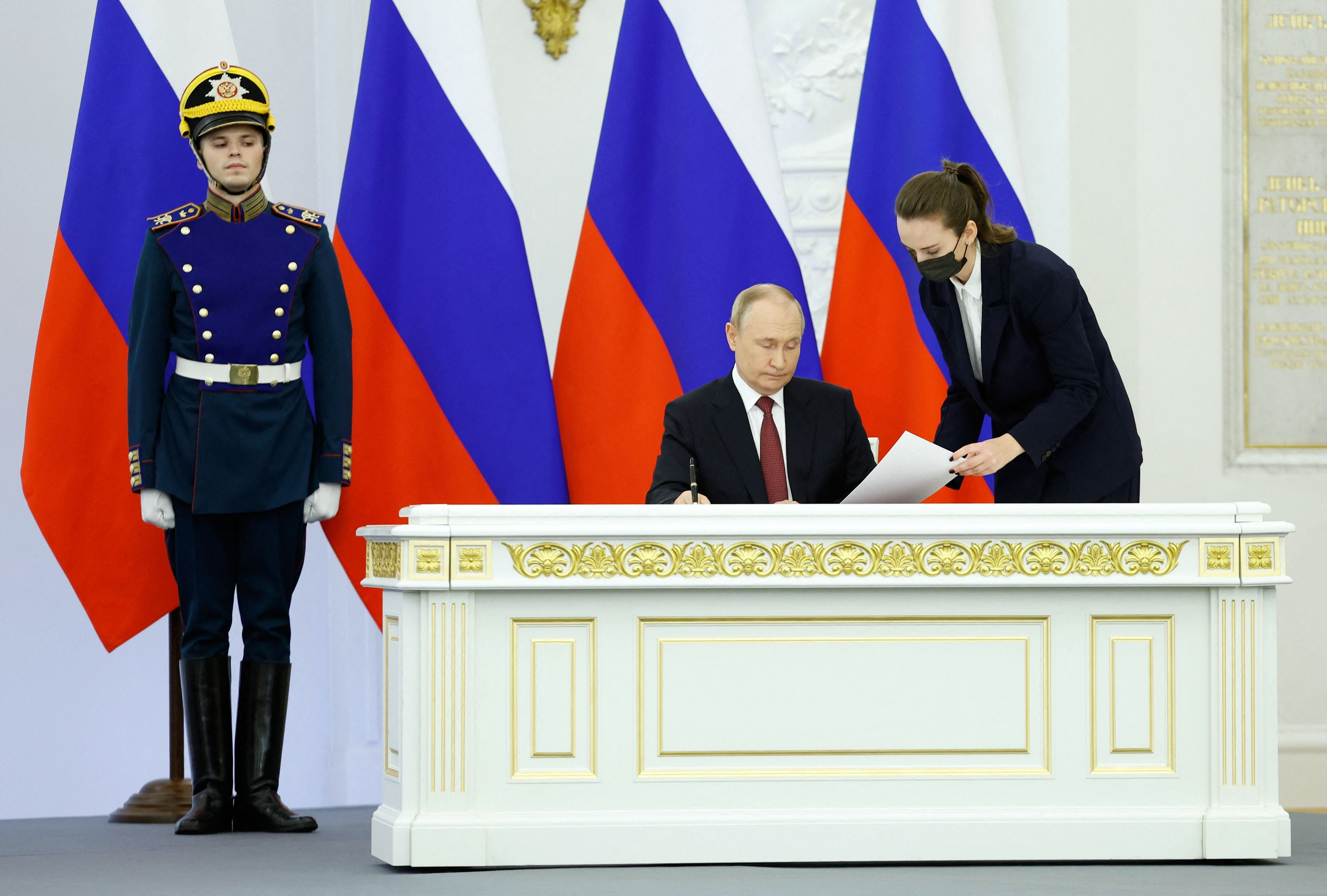 Russian President Vladimir Putin attends a ceremony to sign treaties formally annexing four regions of Ukraine