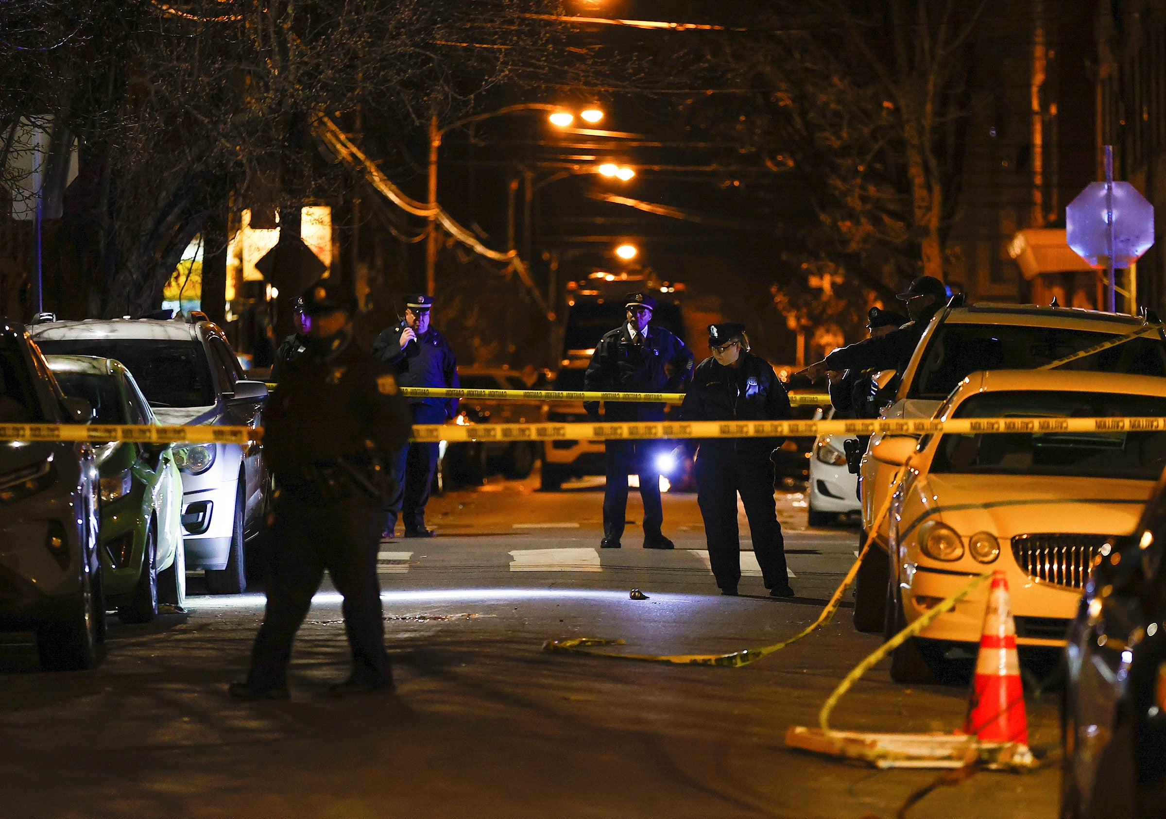 File Philadelphia police officers investigate the fatal shooting of a Temple University police officer near the campus on 18 Feb