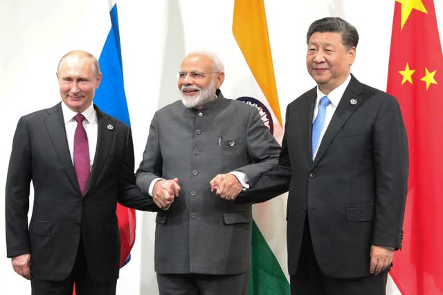 <p>Russian president Vladimir Putin, Indian prime minister Narendra Modi and Chinese president Xi Jinping hold a meeting on the sidelines of the G20 summit in Osaka  in 2019</p>