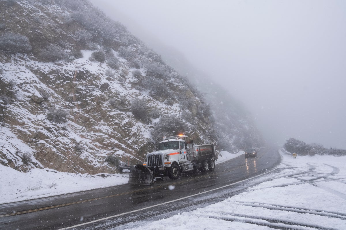 California weather – latest: Extremely rare blizzard strikes with 8ft snow forecast in LA mountains