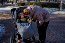 Joy amid sorrow: 1st birthdays muted for Ukrainian parents